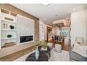 2431 6 Avenue Nw, Calgary, AB  - Indoor Photo Showing Living Room With Fireplace 