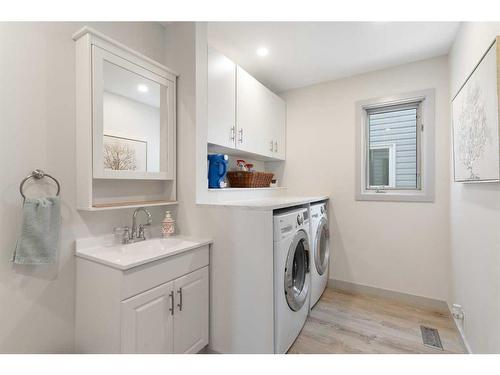 9110 21 Street Se, Calgary, AB - Indoor Photo Showing Laundry Room