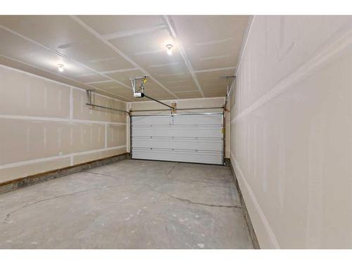 1101-15 Cooperfield Link Sw, Airdrie, AB - Indoor Photo Showing Garage