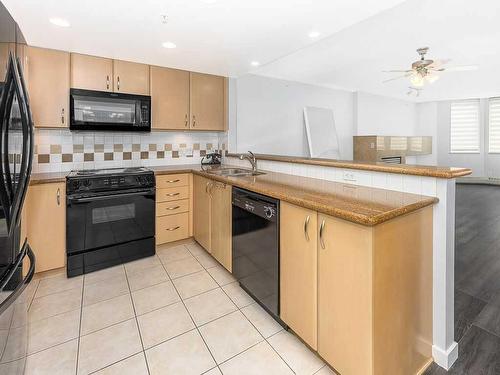 907-1108 6 Avenue Sw, Calgary, AB - Indoor Photo Showing Kitchen