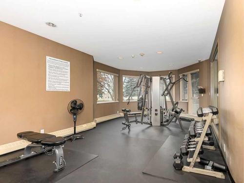 907-1108 6 Avenue Sw, Calgary, AB - Indoor Photo Showing Gym Room