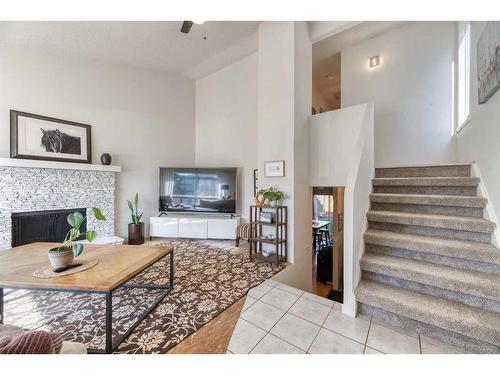 8518 47 Avenue Nw, Calgary, AB - Indoor Photo Showing Living Room With Fireplace