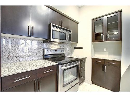 1210-8880 Horton Road Sw, Calgary, AB - Indoor Photo Showing Kitchen With Stainless Steel Kitchen With Upgraded Kitchen