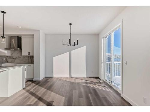 103 Saddlebred Place, Cochrane, AB - Indoor Photo Showing Kitchen