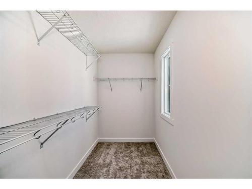 103 Saddlebred Place, Cochrane, AB - Indoor With Storage