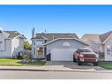 1763 Meadowbrook Drive Se, Airdrie, AB  - Outdoor With Facade 