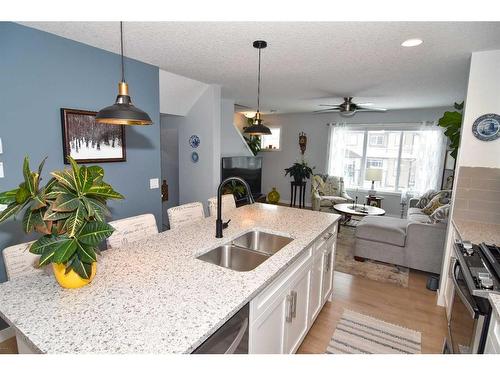 2002-250 Fireside View, Cochrane, AB - Indoor Photo Showing Kitchen With Double Sink