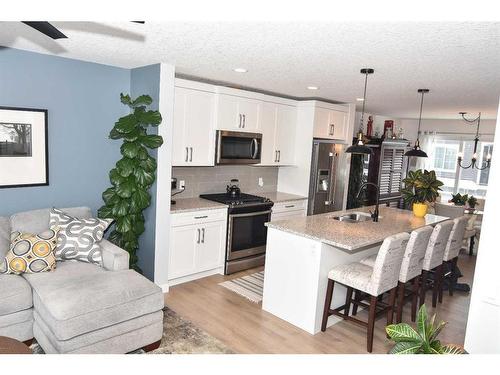 2002-250 Fireside View, Cochrane, AB - Indoor Photo Showing Kitchen With Upgraded Kitchen