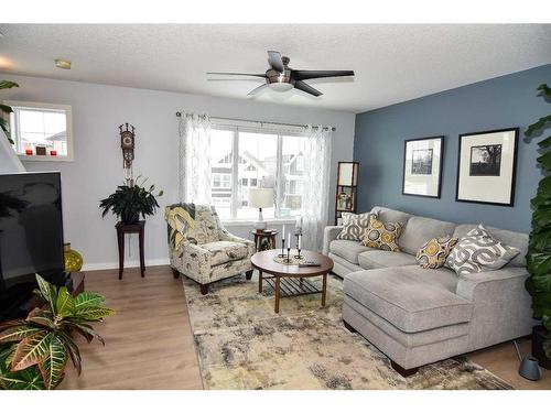 2002-250 Fireside View, Cochrane, AB - Indoor Photo Showing Living Room