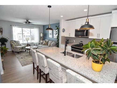 2002-250 Fireside View, Cochrane, AB - Indoor Photo Showing Kitchen With Double Sink With Upgraded Kitchen