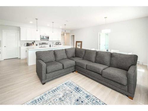 2205-42 Cranbrook Gardens Se, Calgary, AB - Indoor Photo Showing Living Room