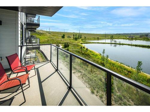 2205-42 Cranbrook Gardens Se, Calgary, AB - Outdoor With Body Of Water With Balcony With View