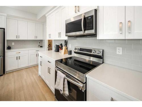 2205-42 Cranbrook Gardens Se, Calgary, AB - Indoor Photo Showing Kitchen