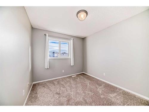 50 Tuscany Springs Heights Nw, Calgary, AB - Indoor Photo Showing Other Room