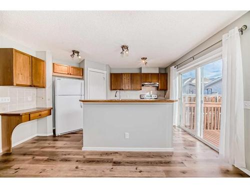 50 Tuscany Springs Heights Nw, Calgary, AB - Indoor Photo Showing Kitchen