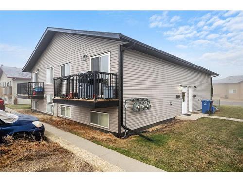 B-4607 46 Street, Innisfail, AB - Outdoor With Deck Patio Veranda With Exterior