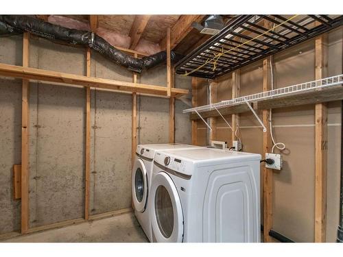 102 Elana Crescent, Lacombe, AB - Indoor Photo Showing Laundry Room