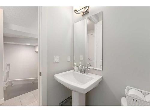 100 Cranbrook Way Se, Calgary, AB - Indoor Photo Showing Bathroom