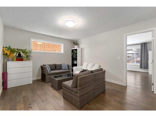 100 Cranbrook Way Se, Calgary, AB - Indoor Photo Showing Living Room