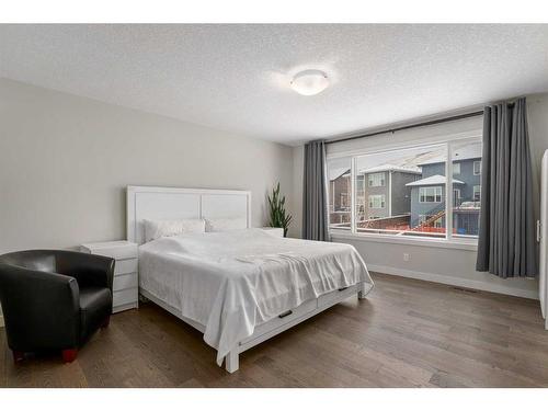 100 Cranbrook Way Se, Calgary, AB - Indoor Photo Showing Bedroom