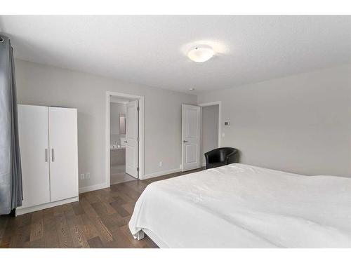 100 Cranbrook Way Se, Calgary, AB - Indoor Photo Showing Bedroom