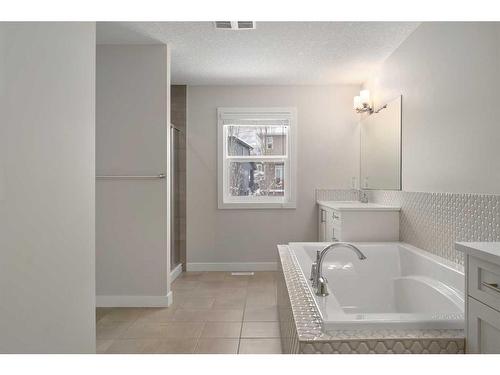 100 Cranbrook Way Se, Calgary, AB - Indoor Photo Showing Bathroom