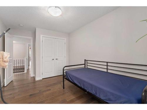 100 Cranbrook Way Se, Calgary, AB - Indoor Photo Showing Bedroom