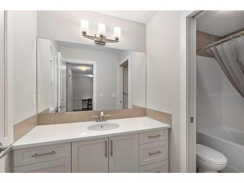 100 Cranbrook Way Se, Calgary, AB - Indoor Photo Showing Bathroom