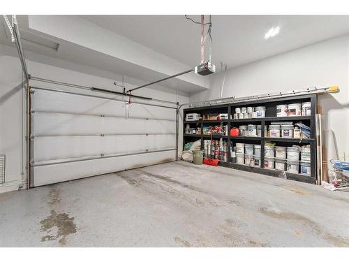 100 Cranbrook Way Se, Calgary, AB - Indoor Photo Showing Garage