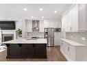 100 Cranbrook Way Se, Calgary, AB  - Indoor Photo Showing Kitchen With Stainless Steel Kitchen With Upgraded Kitchen 