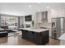 100 Cranbrook Way Se, Calgary, AB  - Indoor Photo Showing Kitchen With Stainless Steel Kitchen With Upgraded Kitchen 