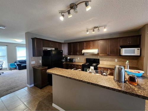 1061 Panatella Boulevard Nw, Calgary, AB - Indoor Photo Showing Kitchen