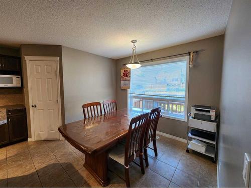 1061 Panatella Boulevard Nw, Calgary, AB - Indoor Photo Showing Dining Room