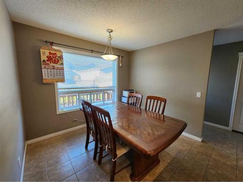 1061 Panatella Boulevard Nw, Calgary, AB - Indoor Photo Showing Dining Room