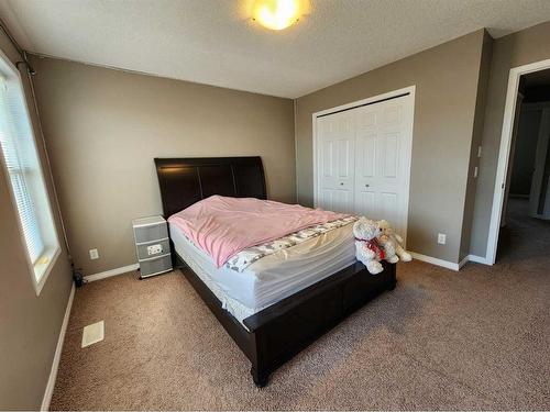 1061 Panatella Boulevard Nw, Calgary, AB - Indoor Photo Showing Bedroom