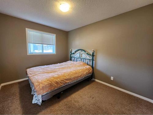 1061 Panatella Boulevard Nw, Calgary, AB - Indoor Photo Showing Bedroom