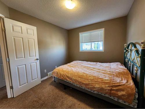 1061 Panatella Boulevard Nw, Calgary, AB - Indoor Photo Showing Bedroom