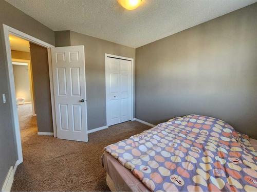 1061 Panatella Boulevard Nw, Calgary, AB - Indoor Photo Showing Bedroom