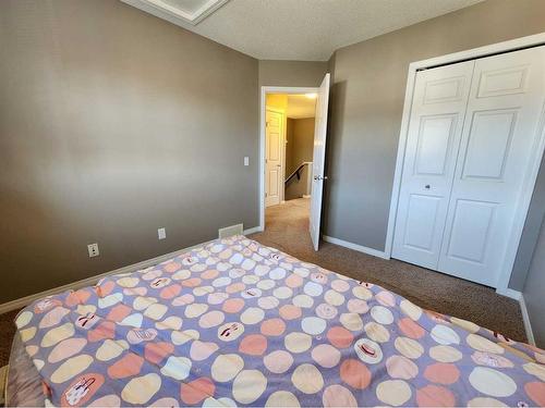 1061 Panatella Boulevard Nw, Calgary, AB - Indoor Photo Showing Bedroom