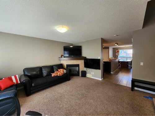 1061 Panatella Boulevard Nw, Calgary, AB - Indoor With Fireplace