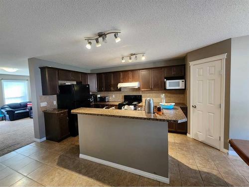 1061 Panatella Boulevard Nw, Calgary, AB - Indoor Photo Showing Kitchen