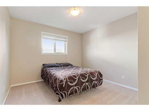 244 Hawkmere View, Chestermere, AB - Indoor Photo Showing Bedroom