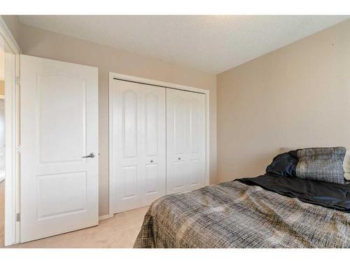 244 Hawkmere View, Chestermere, AB - Indoor Photo Showing Bedroom