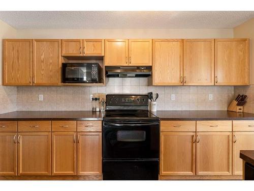 244 Hawkmere View, Chestermere, AB - Indoor Photo Showing Kitchen