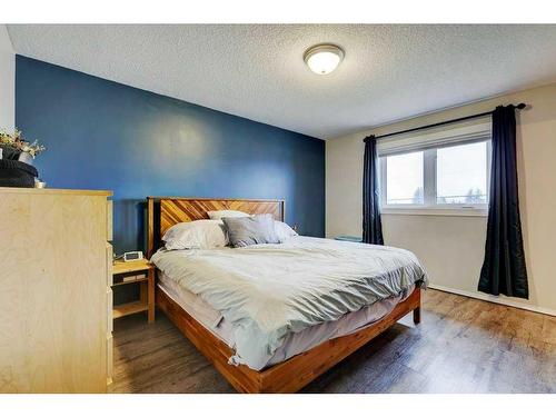 62 Jensen Heights Place Ne, Airdrie, AB - Indoor Photo Showing Bedroom