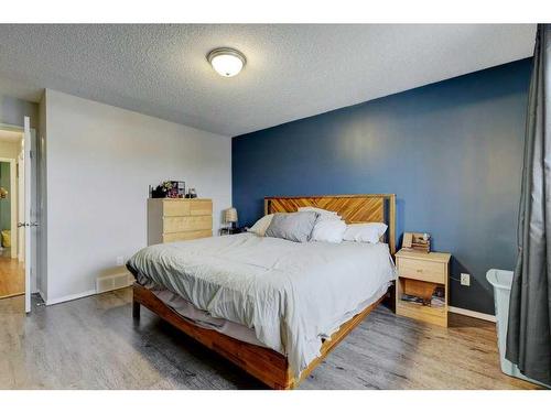 62 Jensen Heights Place Ne, Airdrie, AB - Indoor Photo Showing Bedroom