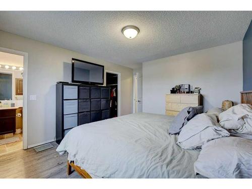 62 Jensen Heights Place Ne, Airdrie, AB - Indoor Photo Showing Bedroom