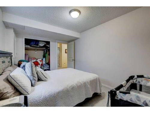 62 Jensen Heights Place Ne, Airdrie, AB - Indoor Photo Showing Bedroom