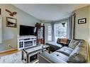 62 Jensen Heights Place Ne, Airdrie, AB  - Indoor Photo Showing Living Room 