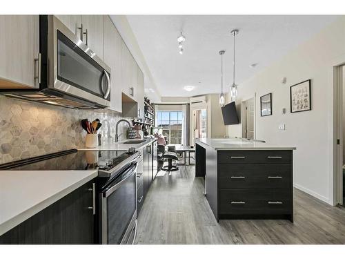 6208-151 Legacy Main Street Se, Calgary, AB - Indoor Photo Showing Kitchen With Upgraded Kitchen